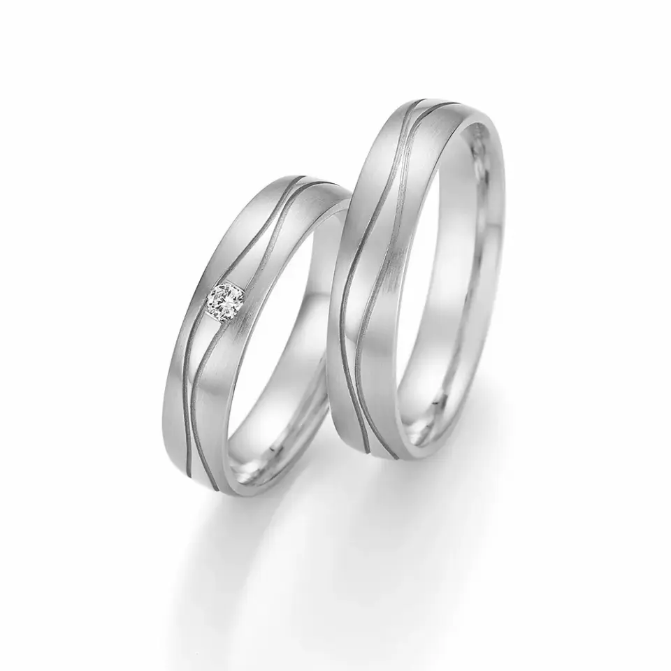 Alianzas de boda de oro blanco con diamante