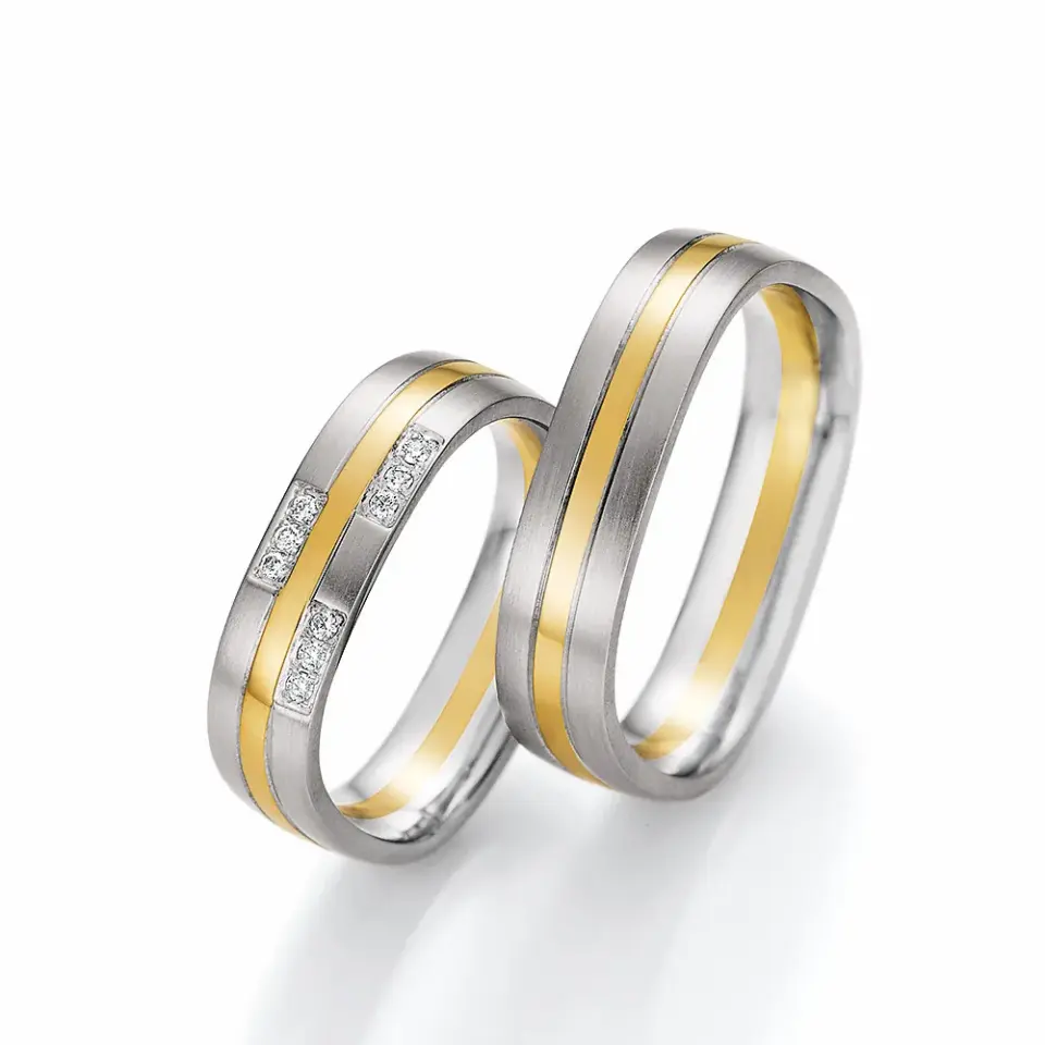 Alianzas de boda de paladio y oro amarillo con diamantes