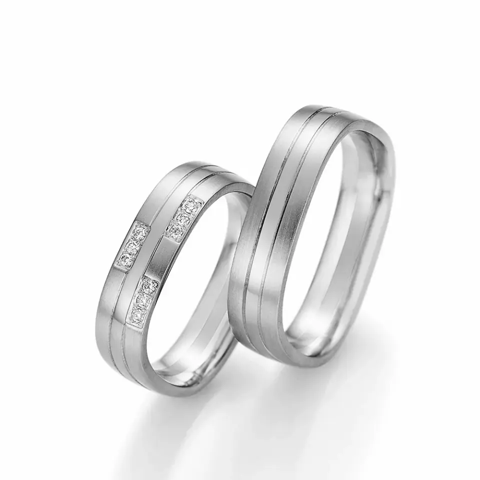 Alianzas de boda de paladio con diamantes