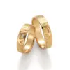 Alianzas de boda de oro amarillo con diamante