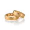 Alianzas de boda de oro amarillo con diamante