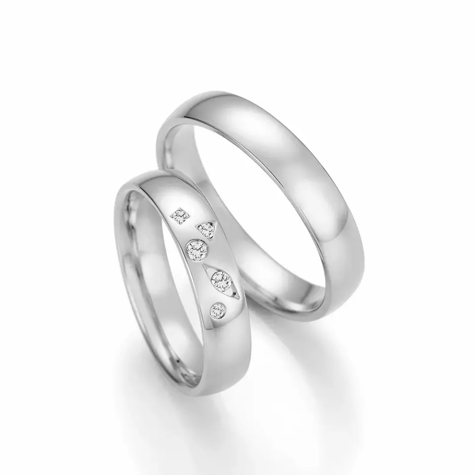 Alianzas de boda de paladio con diamantes