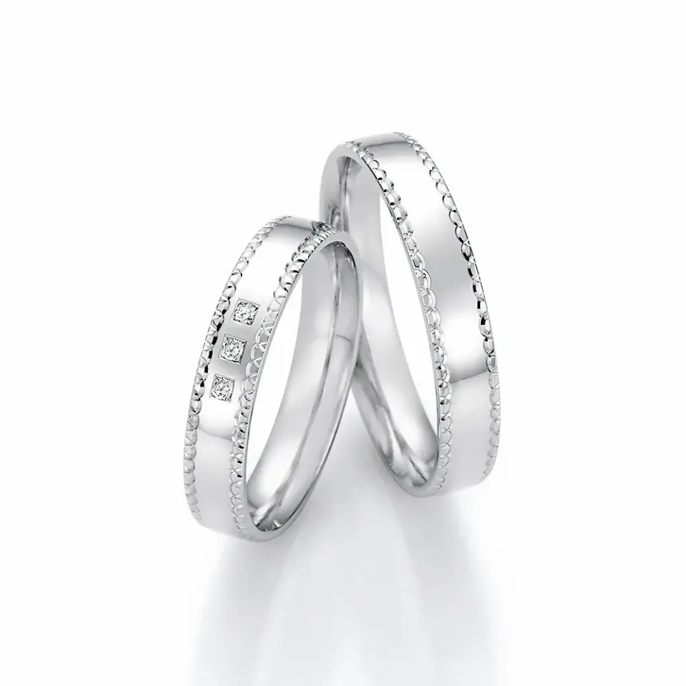 Alianzas de boda de paladio con diamantes