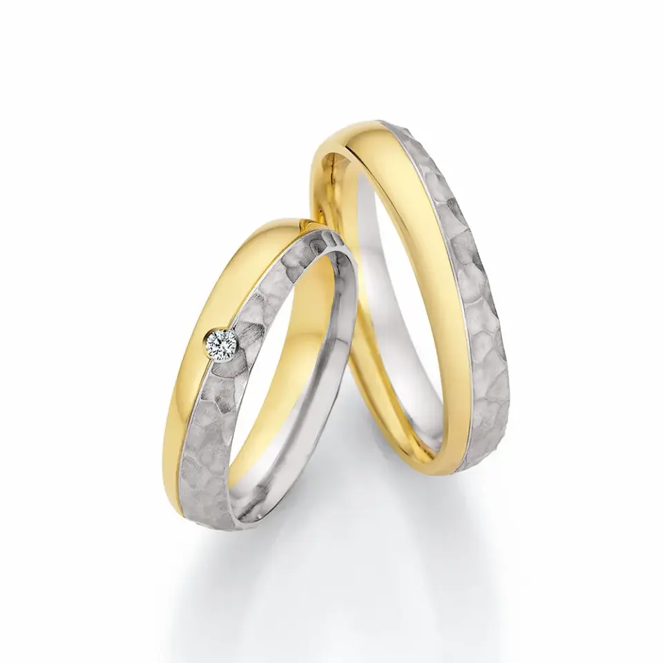 Alianzas de boda de paladio y oro amarillo con diamante