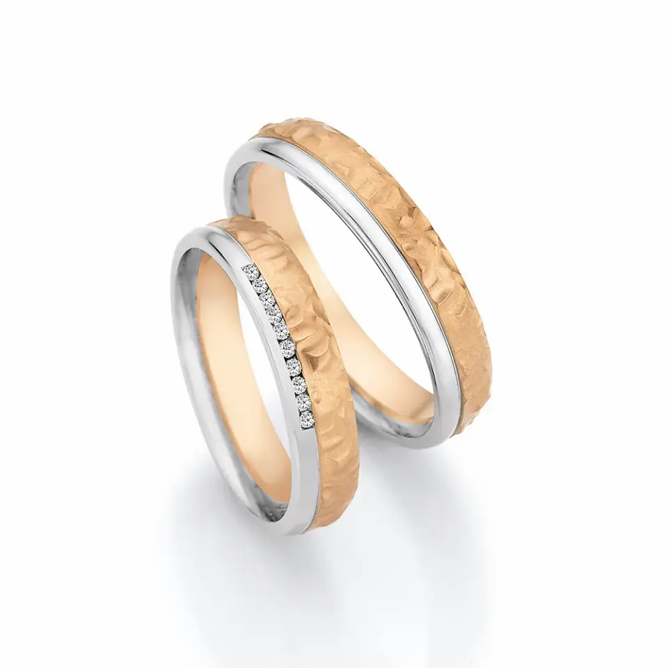 Alianzas de boda de oro rosado y paladio con diamantes