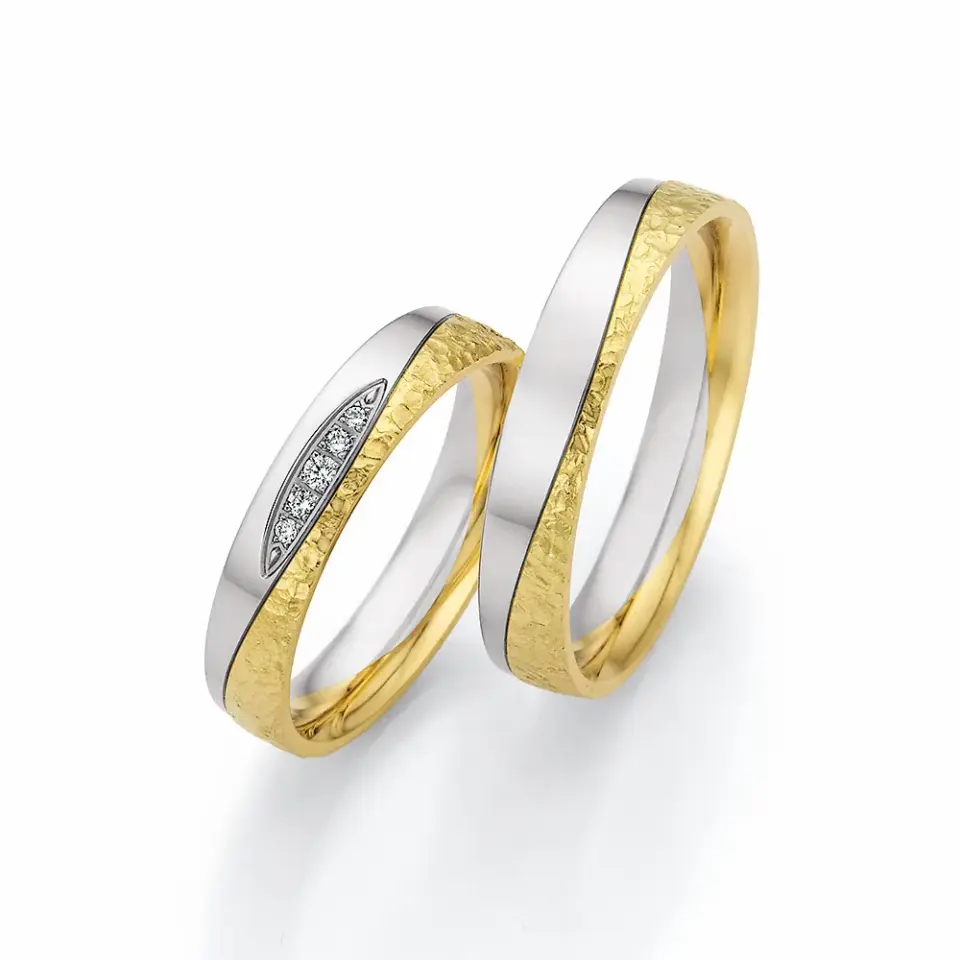 Alianzas de boda de paladio y oro amarillo con diamantes