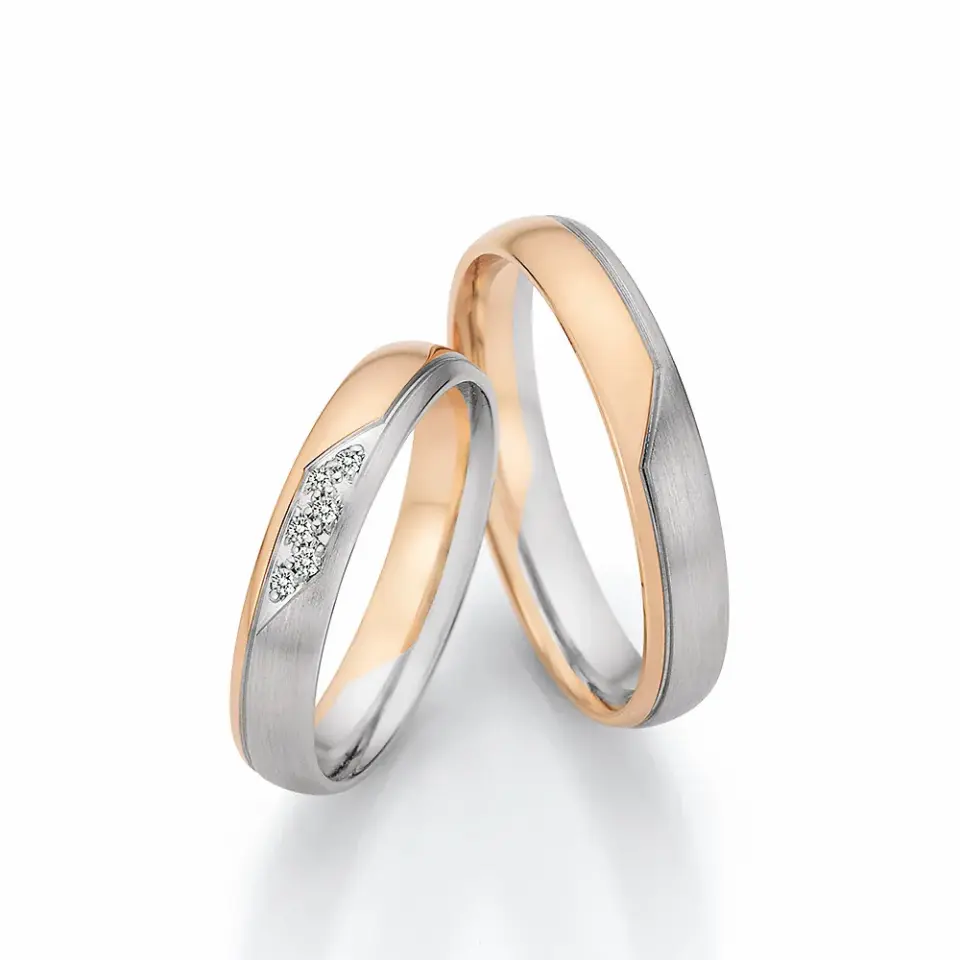 Alianzas de boda de platino y oro rosado con diamantes