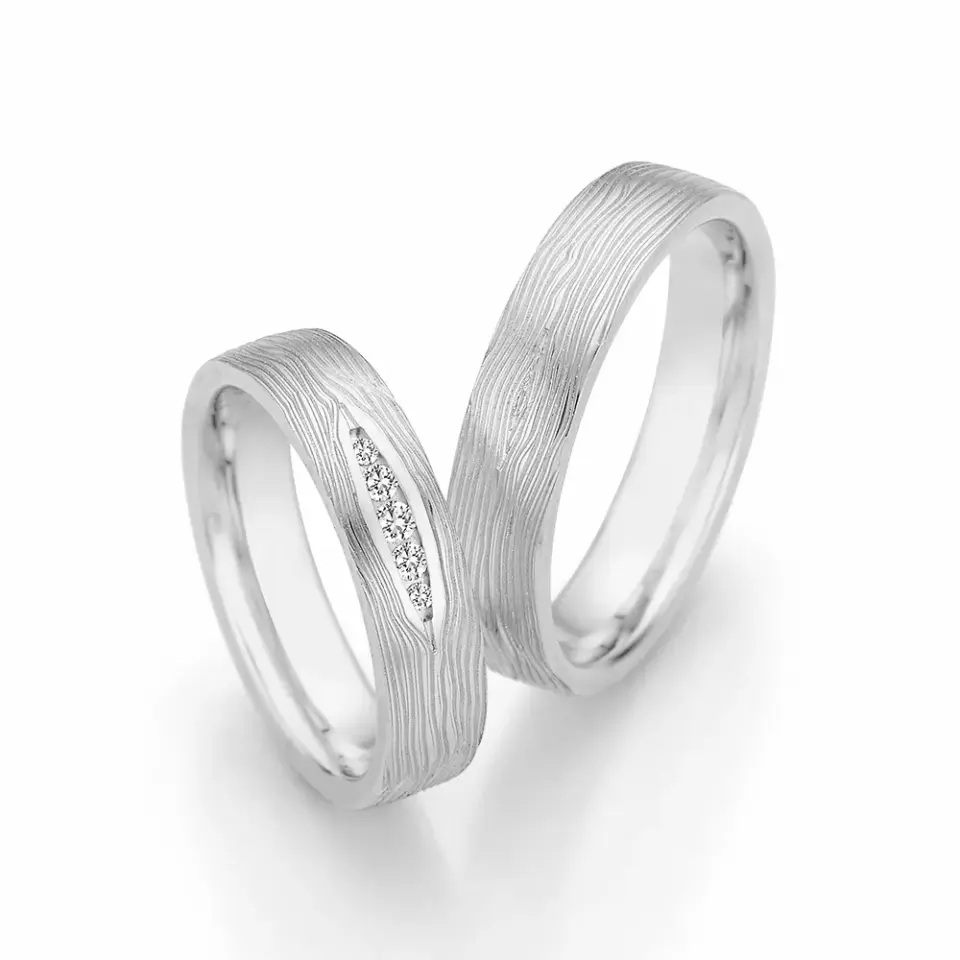 Alianzas de boda de paladio con diamantes