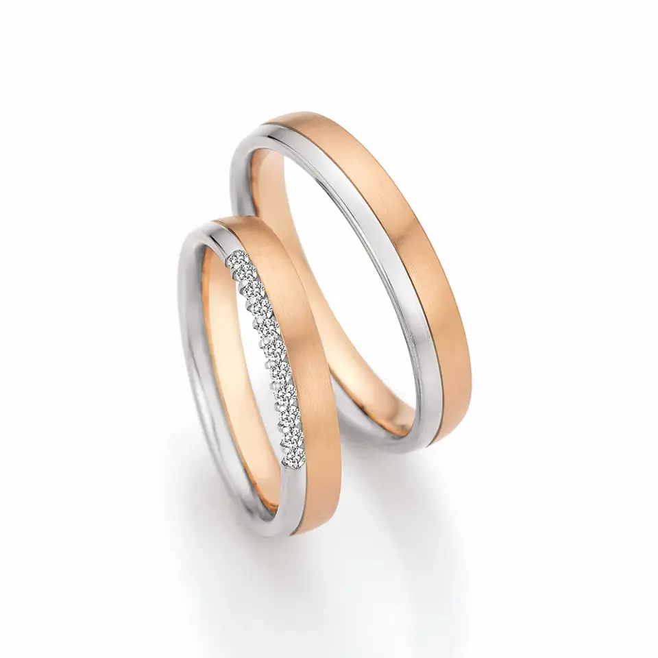 Alianzas de boda de platino y oro rosado con diamantes