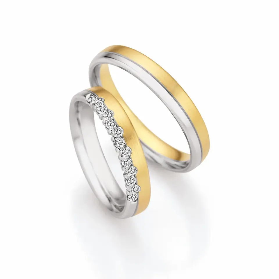 Alianzas de boda de oro amarillo y oro blanco con diamantes