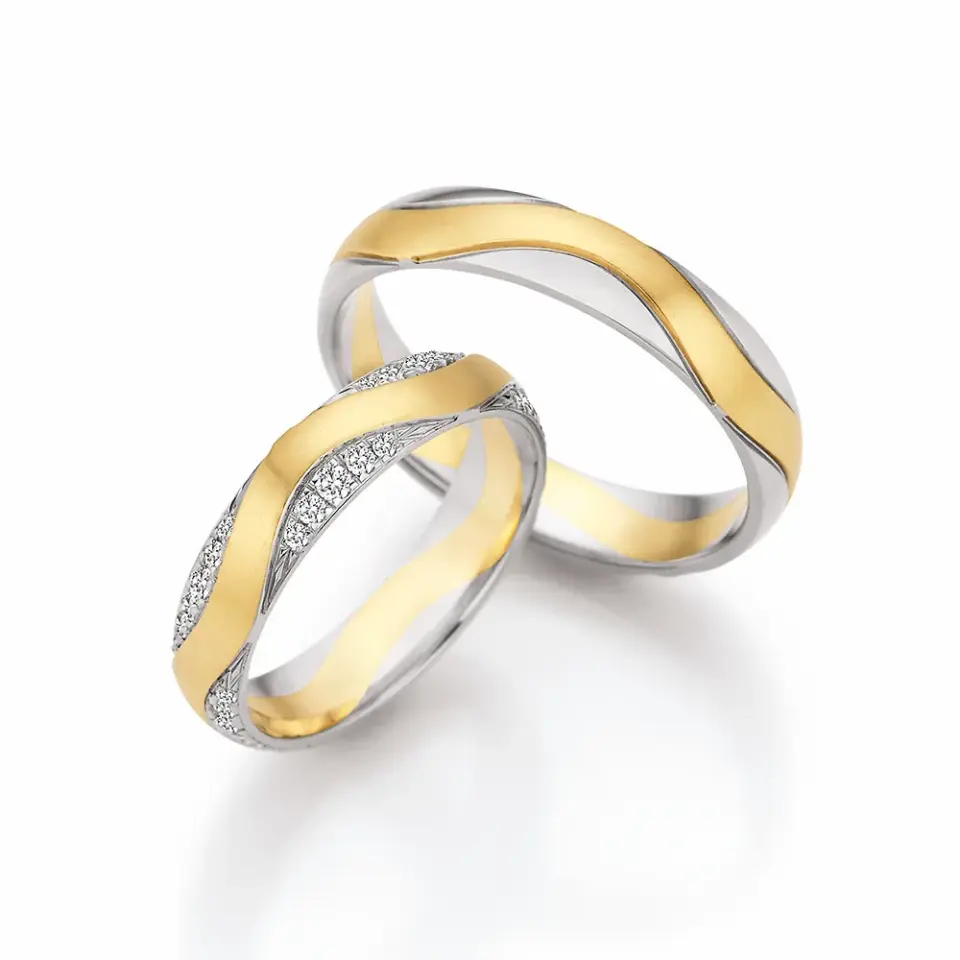 Alianzas de boda de paladio y oro amarillo con diamantes