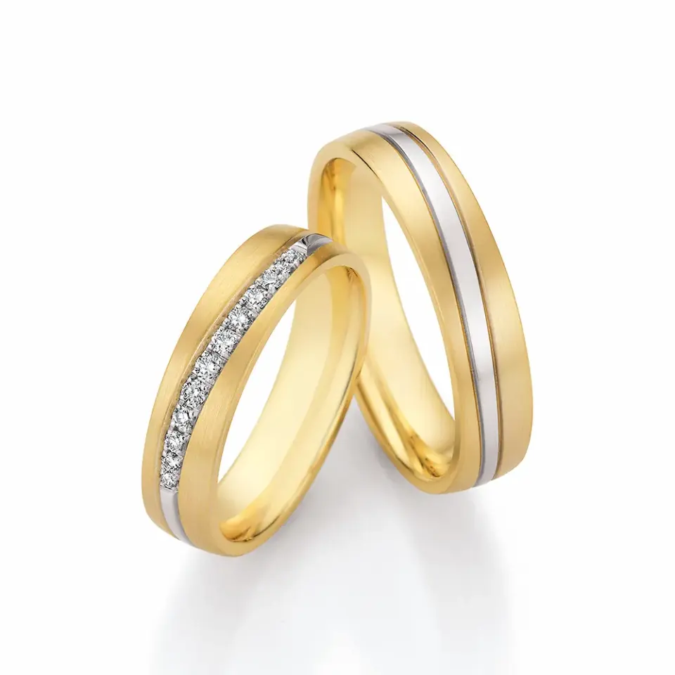 Alianzas de boda de oro amarillo y oro blanco con diamantes