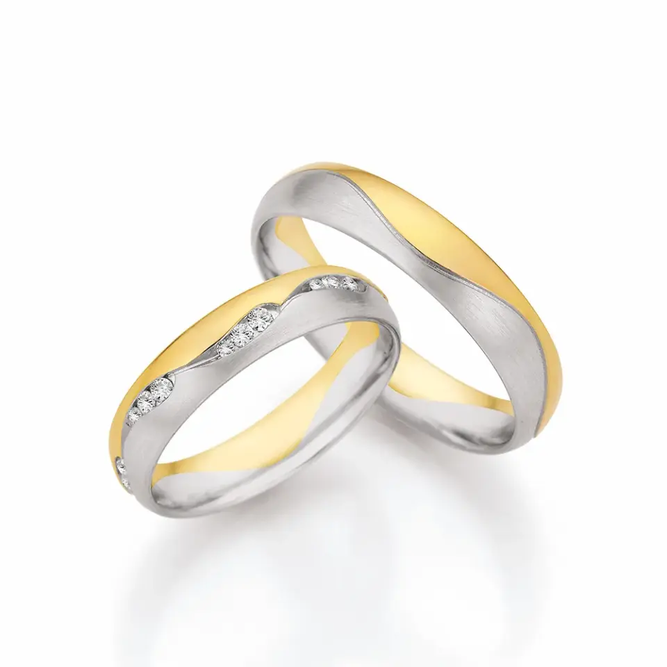 Alianzas de boda de paladio y oro amarillo con diamantes