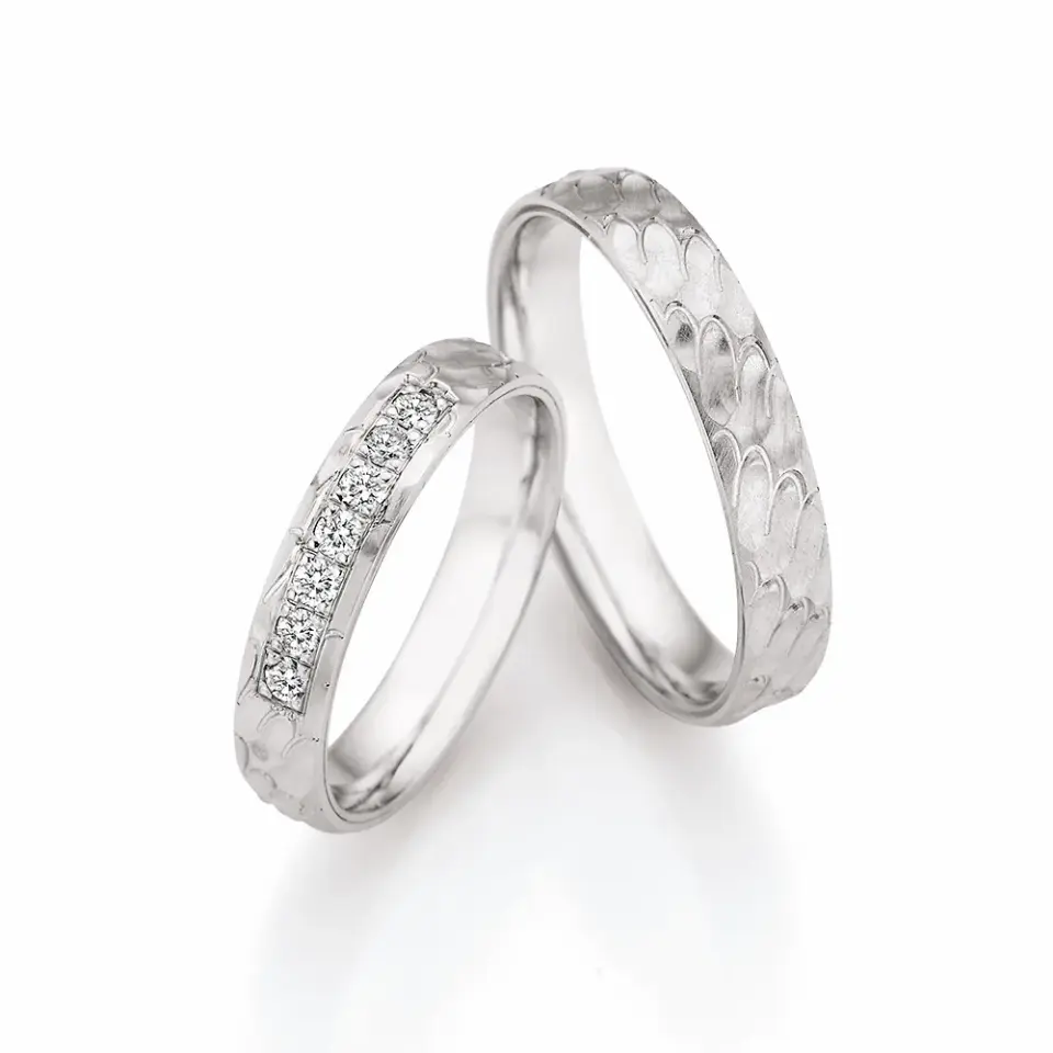 Alianzas de boda de paladio con diamantes