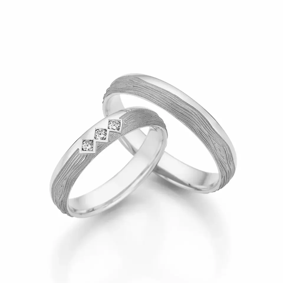 Alianzas de boda de paladio con diamantes