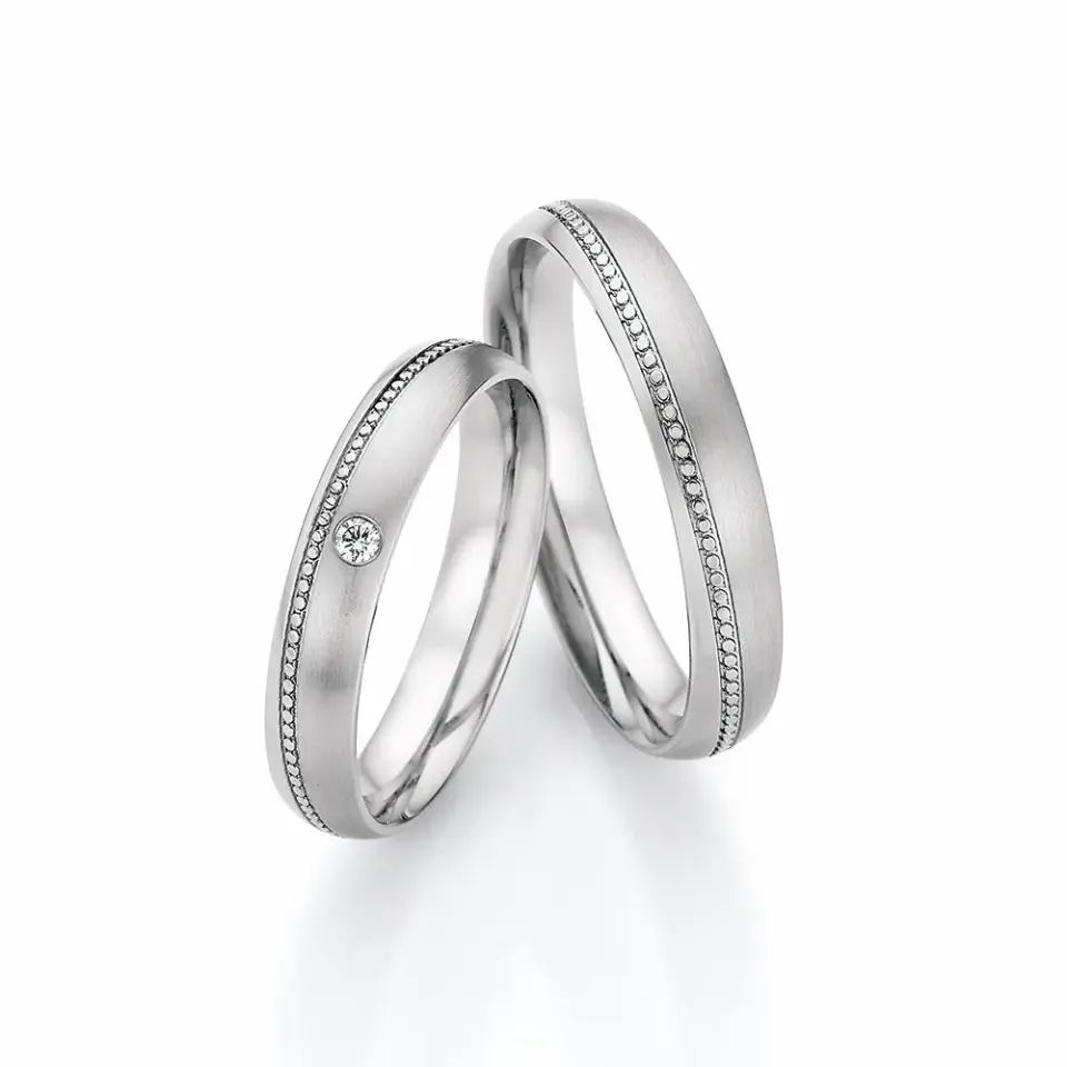 Alianzas de boda de acero con diamante