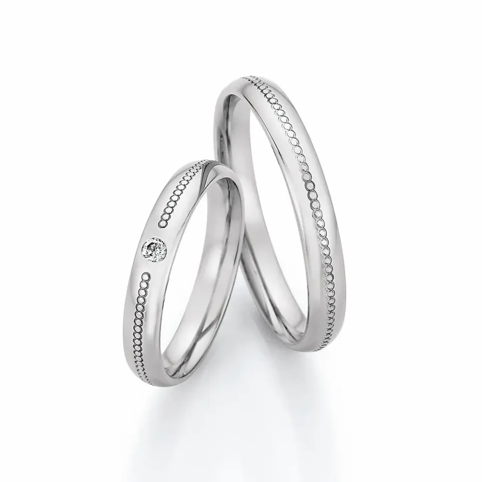 Alianzas de boda de acero con diamante
