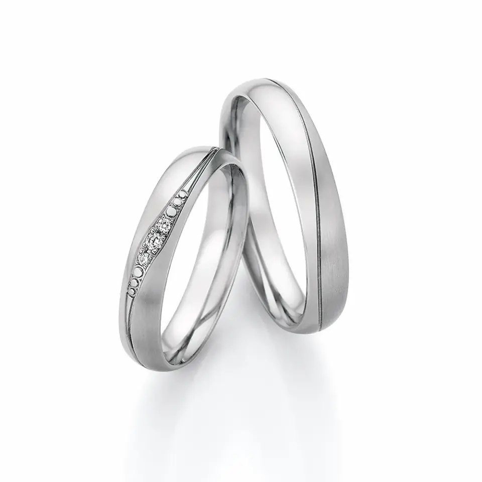 Alianzas de boda de acero con diamantes
