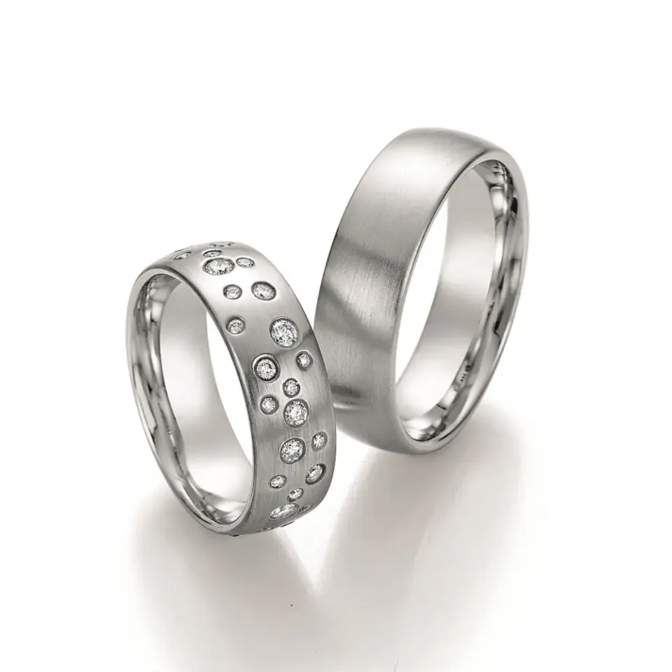 Alianzas de boda de paladio con diamantes