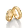 Alianzas de boda de oro amarillo con diamantes