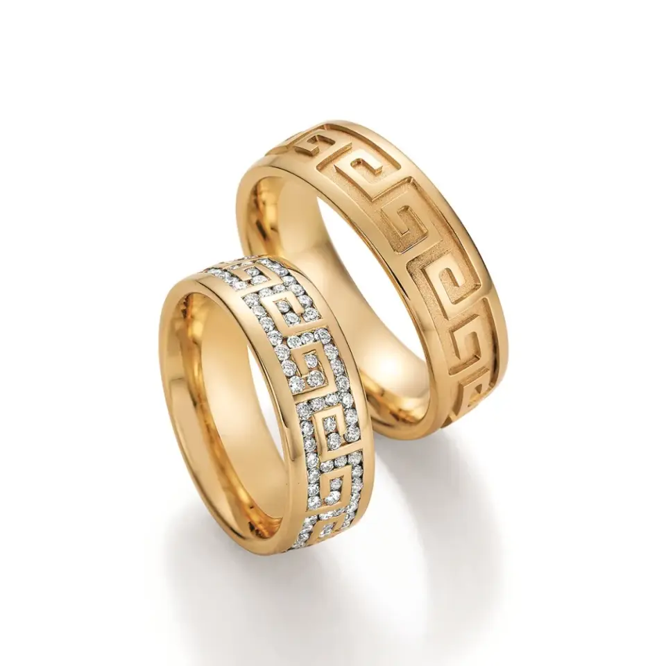 Alianzas de boda de oro amarillo con diamantes
