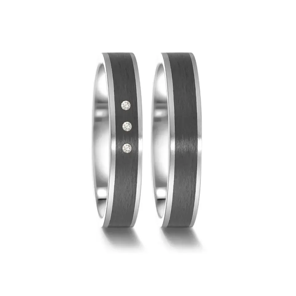Alianzas de boda de acero y carbono con diamantes