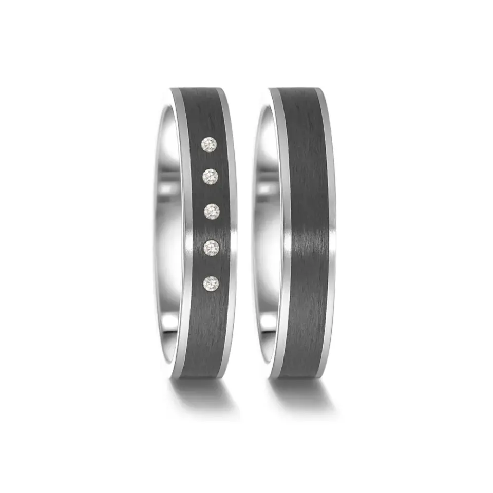 Alianzas de boda de acero y carbono con diamantes