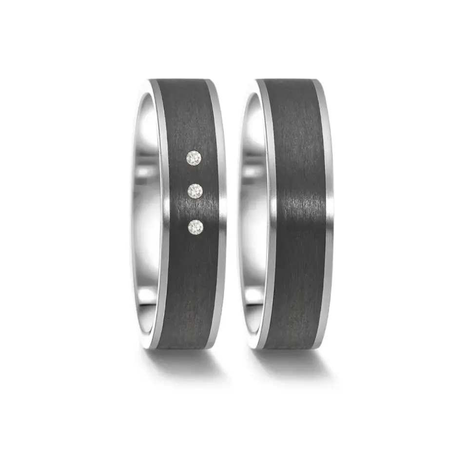 Alianzas de boda de acero y carbono con diamantes