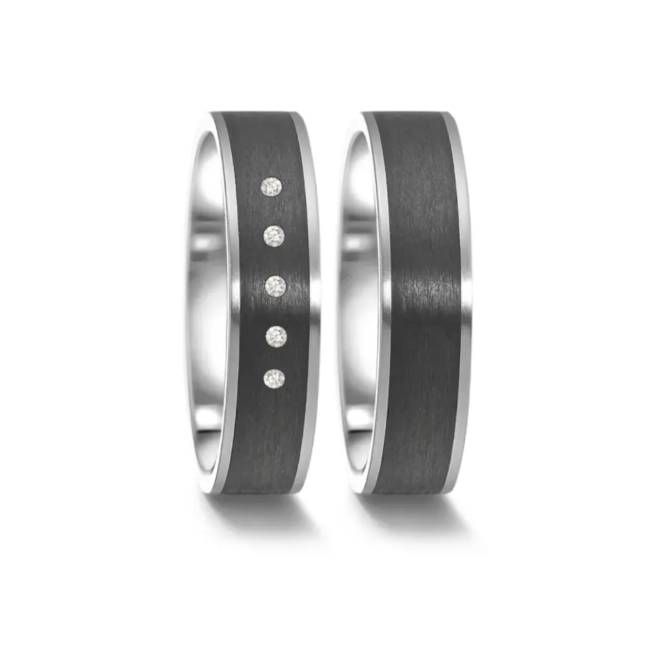 Alianzas de boda de acero y carbono con diamantes