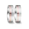 Alianzas de boda de acero y oro rosado con diamantes