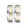 Alianzas de boda de acero y oro amarillo con diamantes
