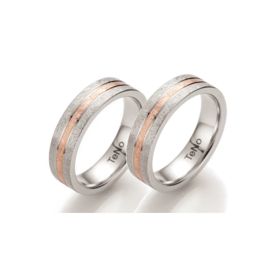 Alianzas de boda de acero y oro rosado