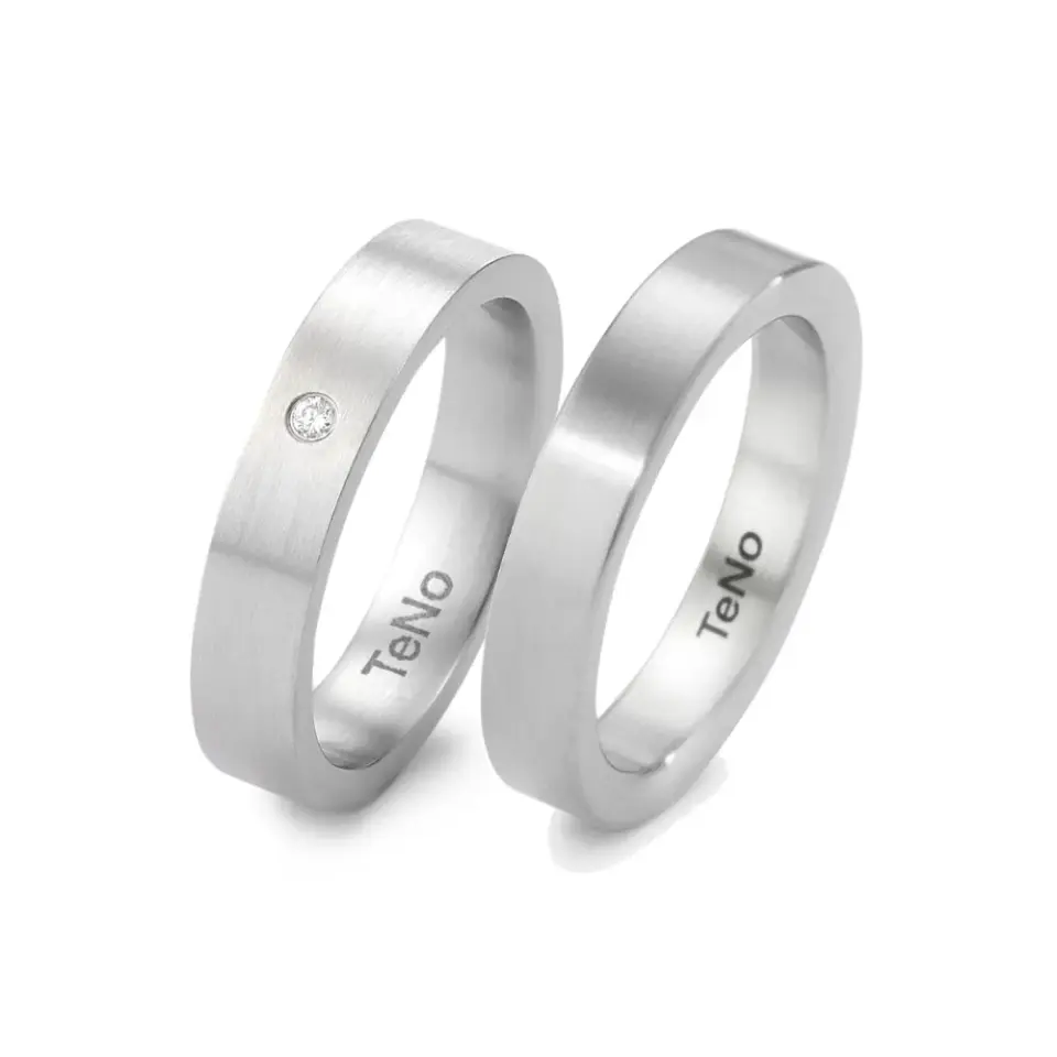 Alianzas de boda de acero con diamante