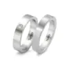 Alianzas de boda de acero con diamante