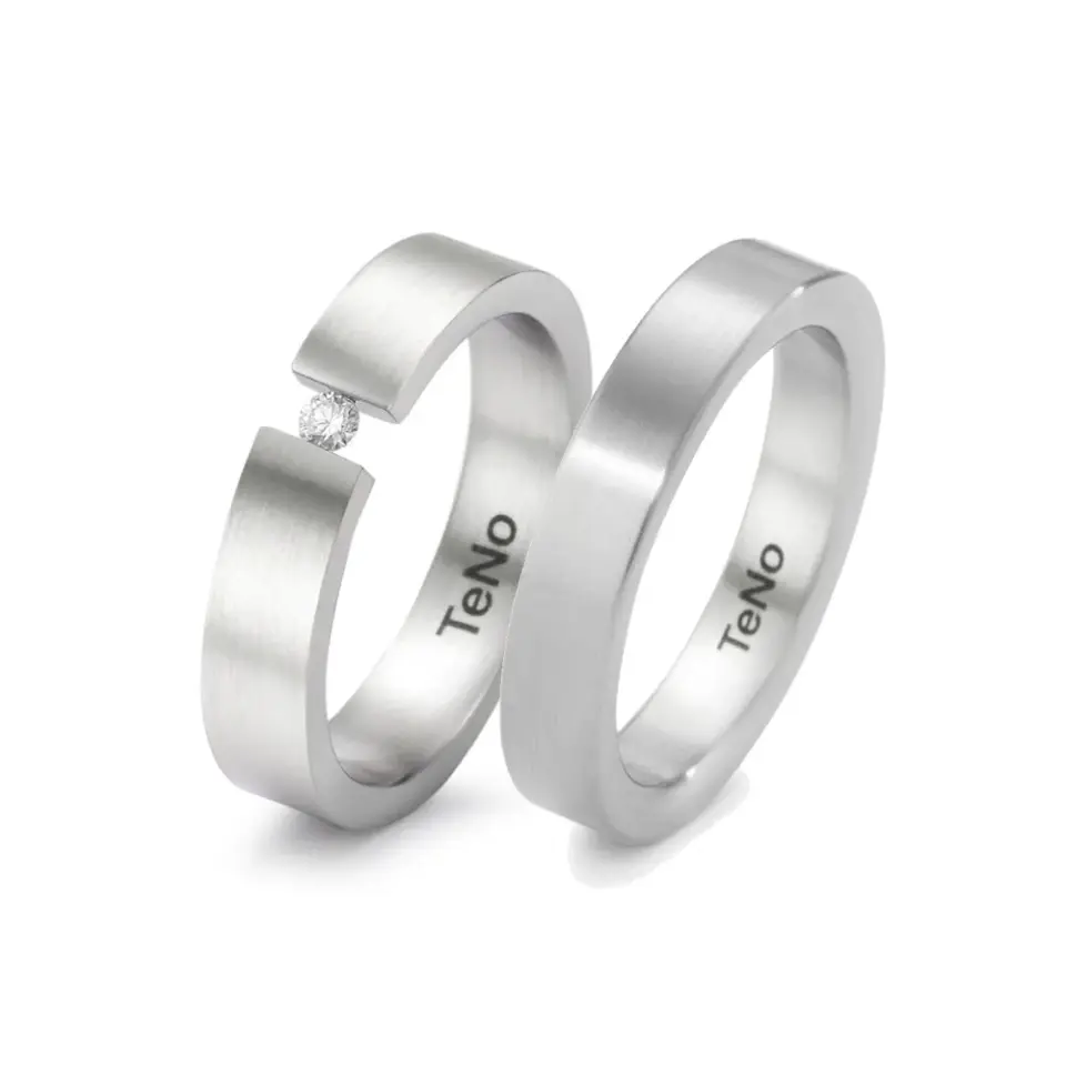 Alianzas de boda de acero con diamante