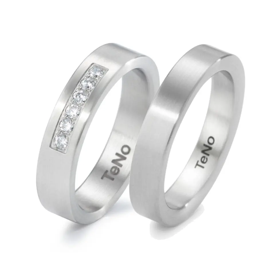 Alianzas de boda de acero con diamantes