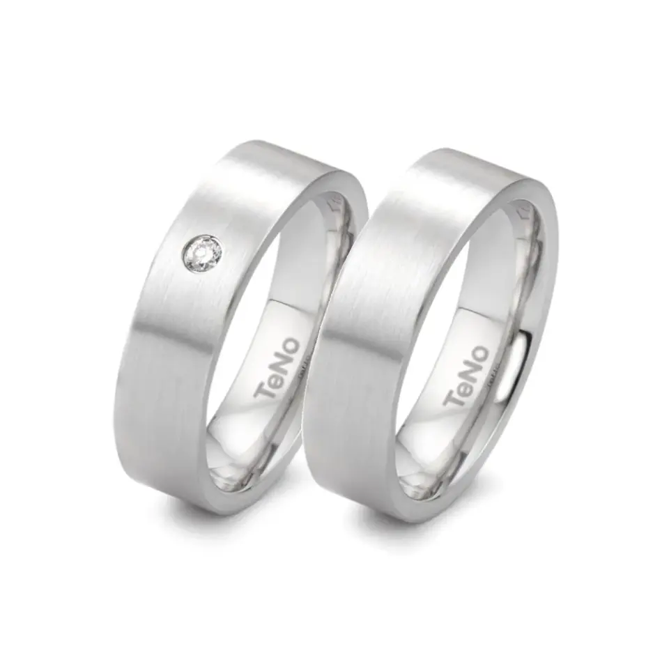 Alianzas de boda de acero con diamante