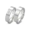 Alianzas de boda de acero con diamante