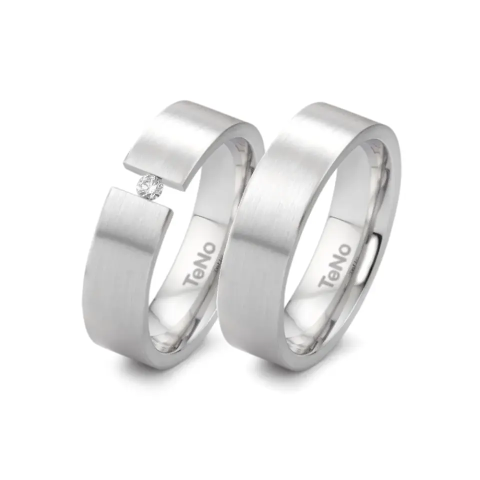 Alianzas de boda de acero con diamante