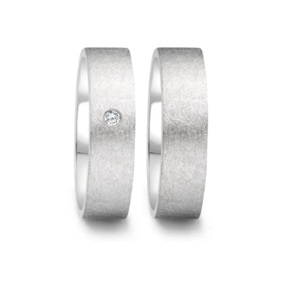 Alianzas de boda de acero con diamante