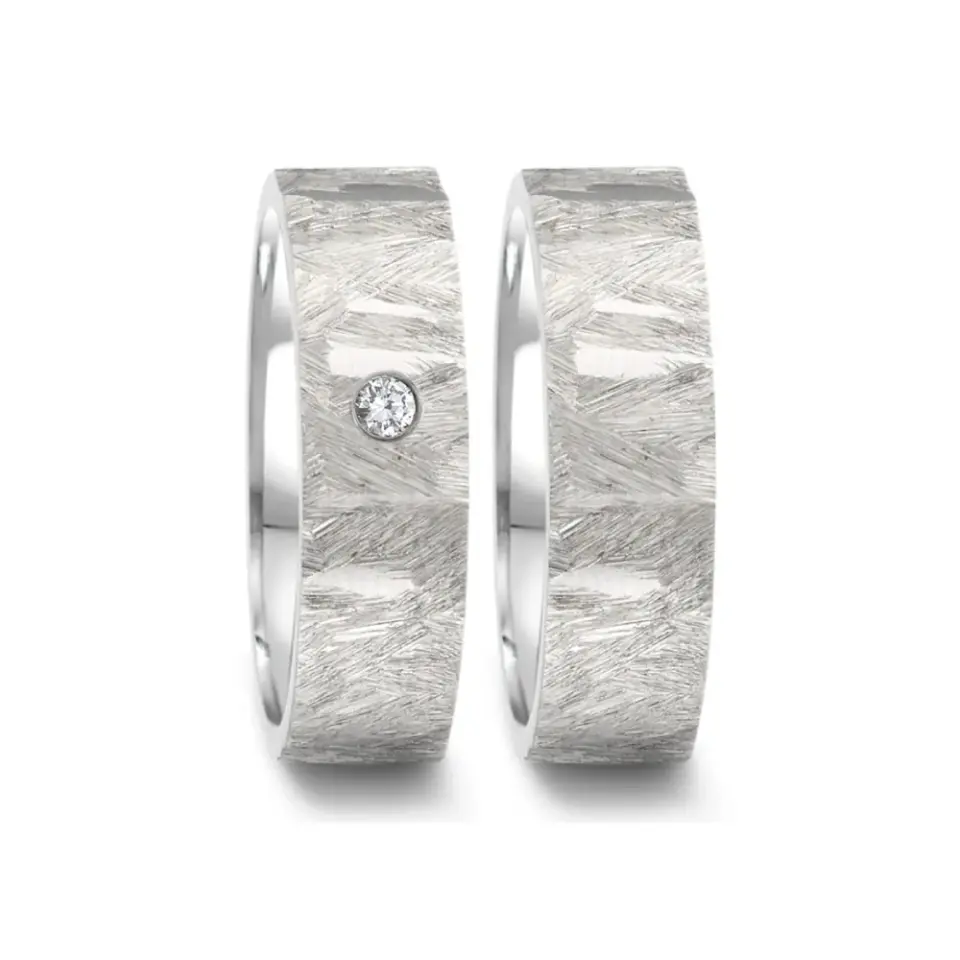 Alianzas de boda de acero con diamante