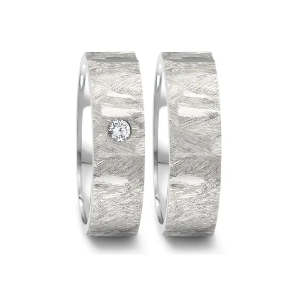 Alianzas de boda de acero con diamante