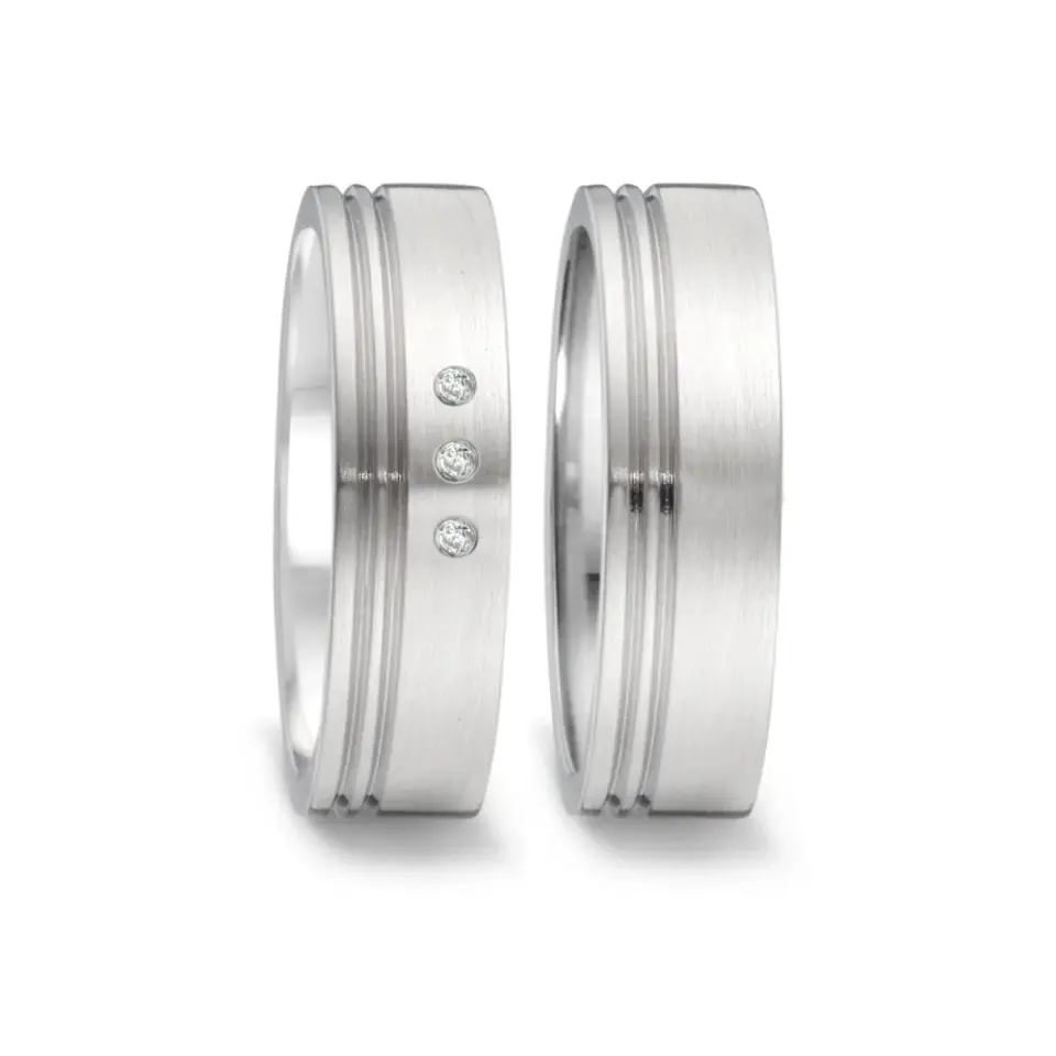 Alianzas de boda de acero con diamantes