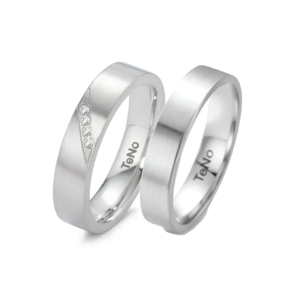 Alianzas de boda de acero con diamantes