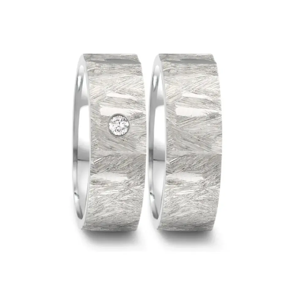 Alianzas de boda de acero con diamante