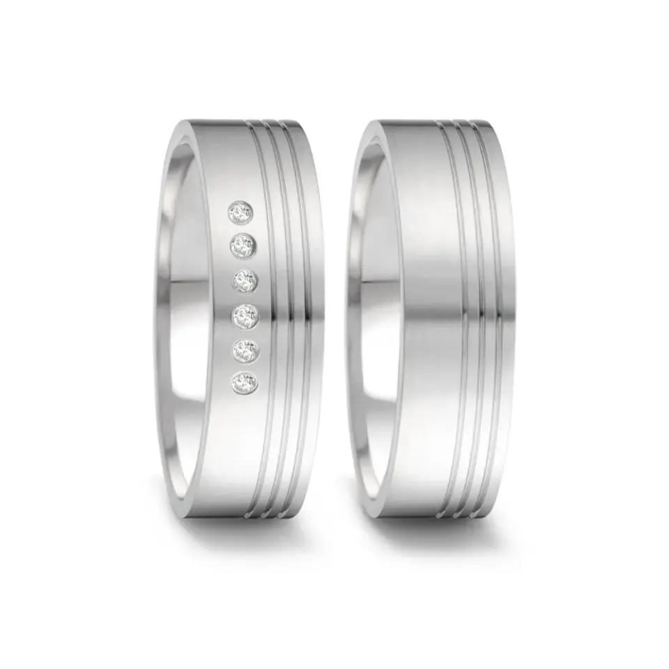 Alianzas de boda de acero con diamantes