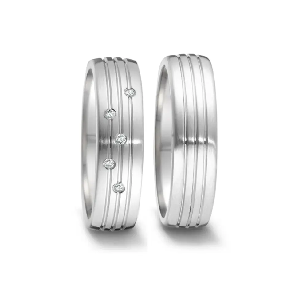 Alianzas de boda de acero con diamantes