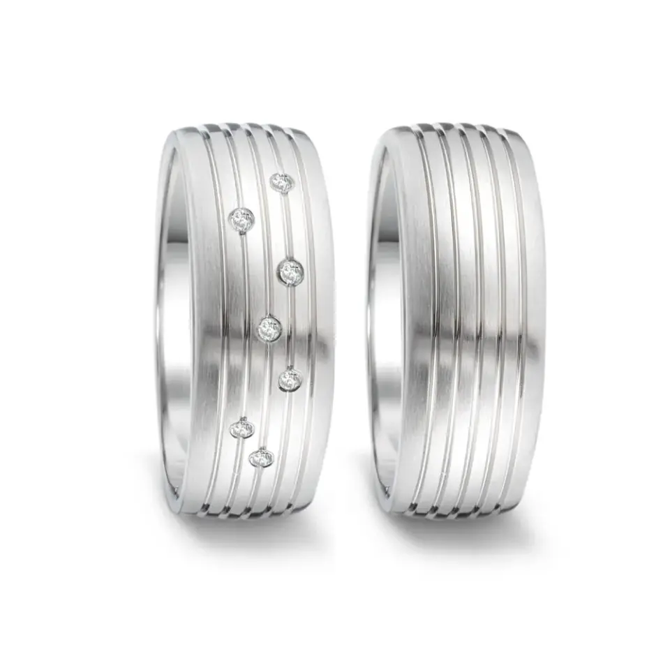 Alianzas de boda de acero con diamantes