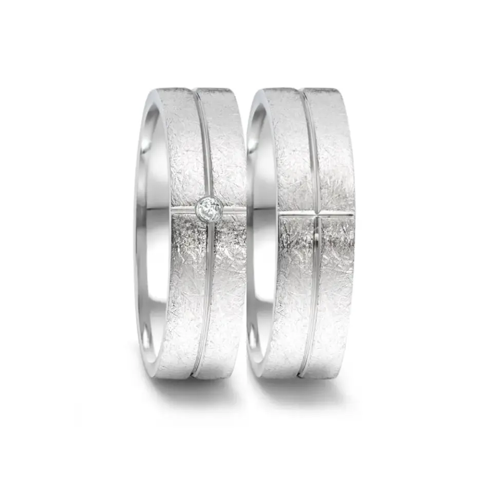 Alianzas de boda de acero con diamante