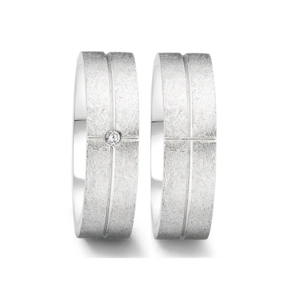 Alianzas de boda de acero con diamante
